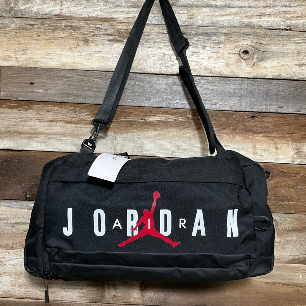Jordan Velocity Duffle bag in black with a red Jumpman logo